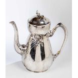 An art noveau silver coffee pot. Germany, Heilbronn, Bruckmann & Söhne, circa 1910.Embossed