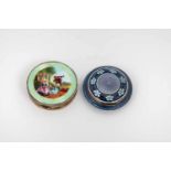 Two silver and enamel pill boxes. One with guilloched ground, hinged lid with enamelpainting,