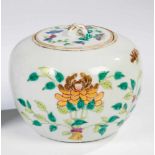 Lidded vase. China, 19th century. Circulating floral decoration, partially gilt. Faded redfour-