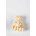 Netsuke. Japan, Meiji period, 19th century. Hand with monkey. Ivory carved. Signed. 4.5 x3 x 1.5 cm.