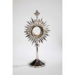 Monstrance. Circa 1920. Silver foot, plated corona, brass inlay. Corona bended. 43 cmhigh.