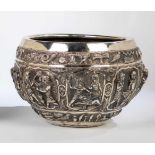 A large silver bowl with egypt decor. India, first half of the 20th century. Round bodywith embossed