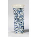 Vases. China, Kangxi mark. Cylindrical vase with widened lip. Floral decor with twodragons. On the
