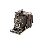 A Graflex Speed Graphic Camera,