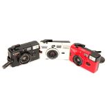 Two Konica Pop Compact Cameras,