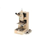 A Vickers Trinocular Patholux Microscope,