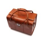 A Nikon Tan Outfit Bag,