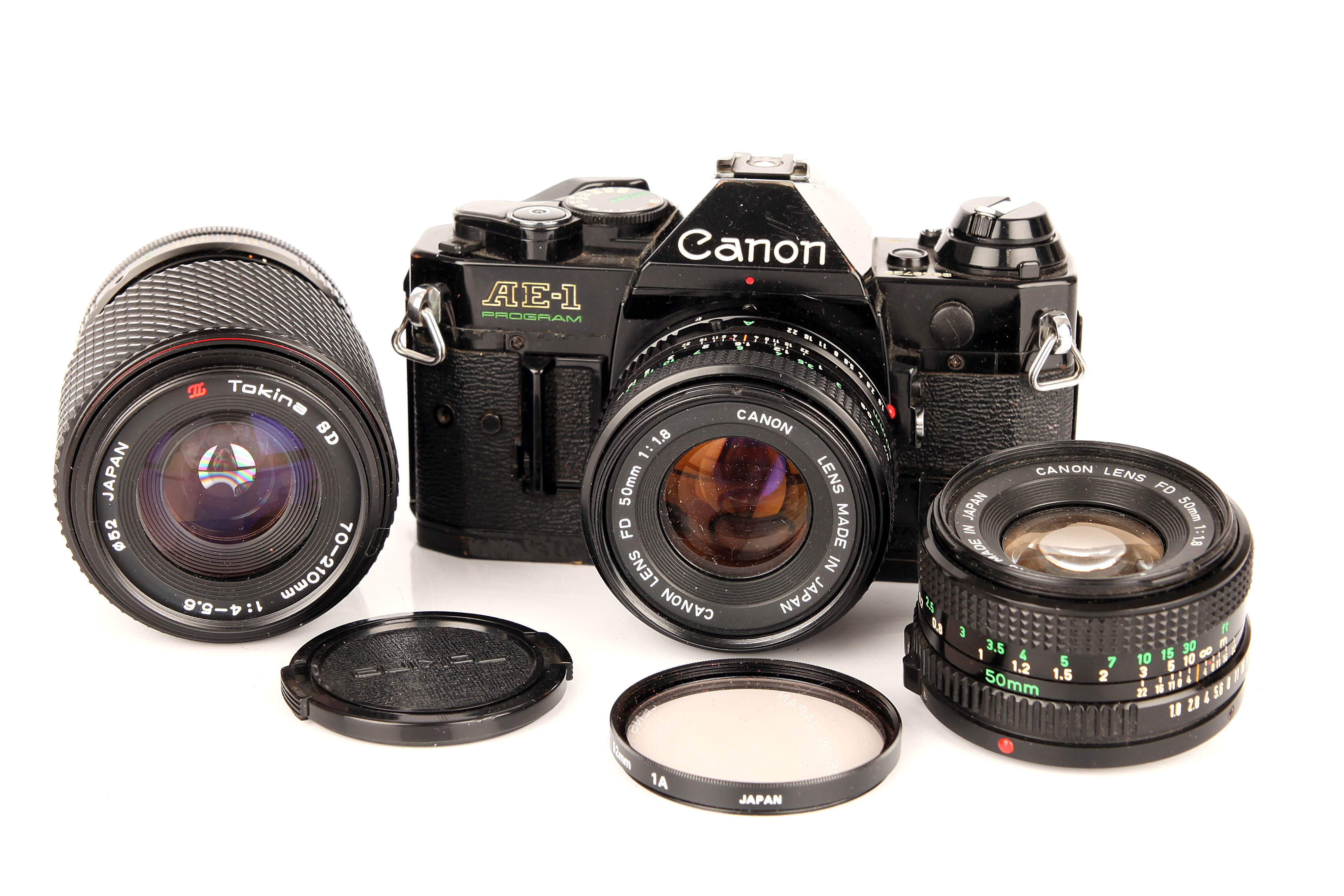 A Canon AE-1 Program SLR Camera,