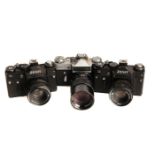 Three Zenit SLR Cameras,