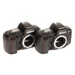 Two Nikon F90 SLR Bodies,