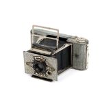 A Houghton Ensign Midget Silver Jubilee Folding Camera,