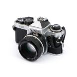 A Nikon FE2 SLR Camera,