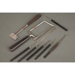 A Collection of Surgical Instruments with Ebony Handles,