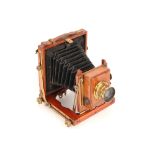 A Quarter Plate Brass & Mahogany Field Camera,