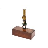 A Box Mounted Compound Microscope by Chevalier, Paris,