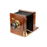 A City Sale & Exchange Half Plate Mahogany Tailboard Camera,