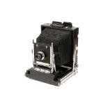 An Unmarked Black Painted Mahogany Half Plate Field Camera,