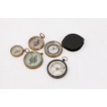 A Collection of Five Pocket Compasses