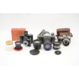 A Small Selection of Various Cameras & Lenses,