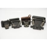 Four Early Ensign Folding Cameras,