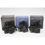 Three Canon Digital Compact Cameras,