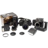 Two Oympus OM-2 Spot / Program SLR Cameras,