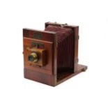 An E. Mazo Opticien Mahogany Tailboard Camera,