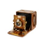 A Sanderson Tropical Hand & Stand Camera,