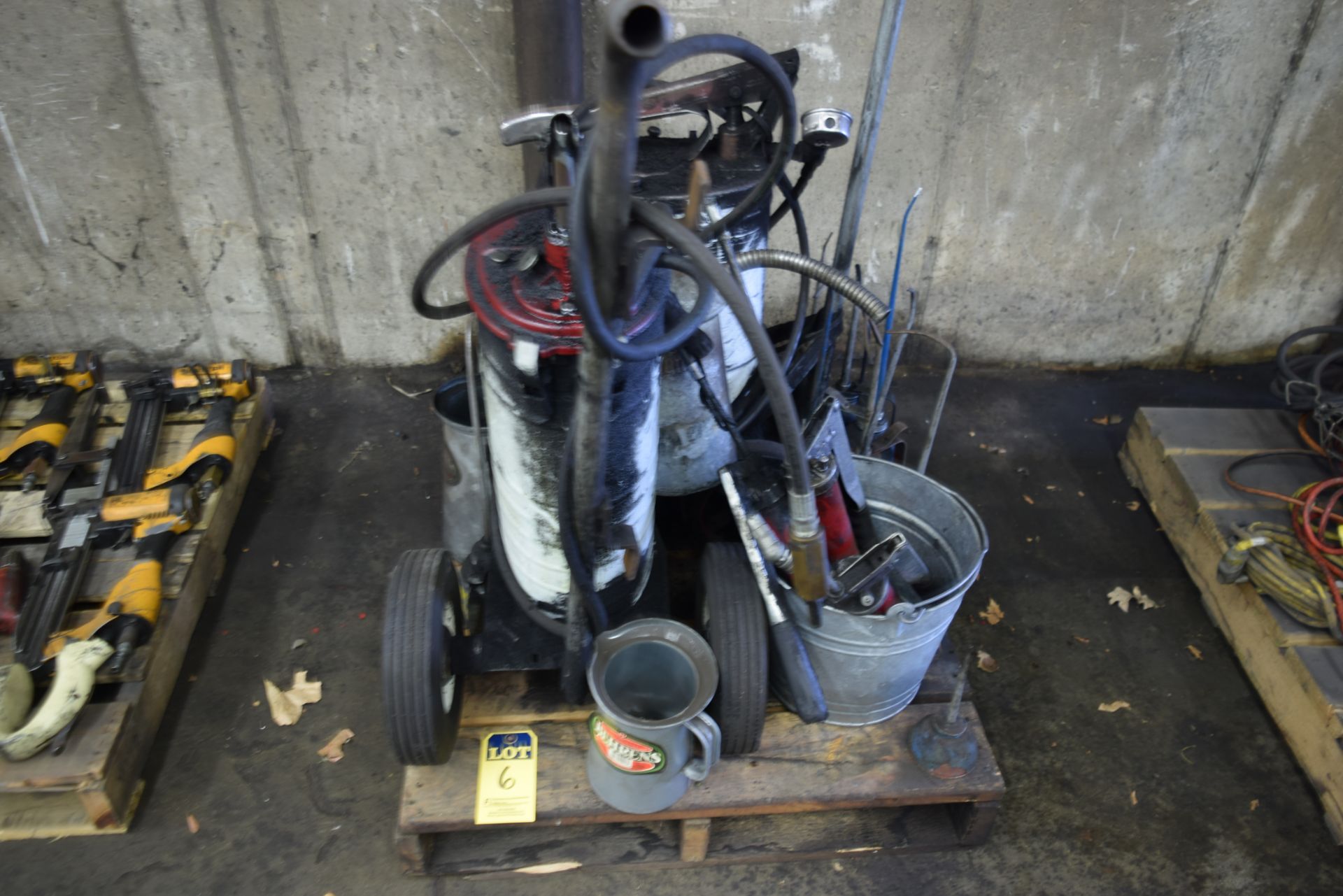 skid of grease pumps