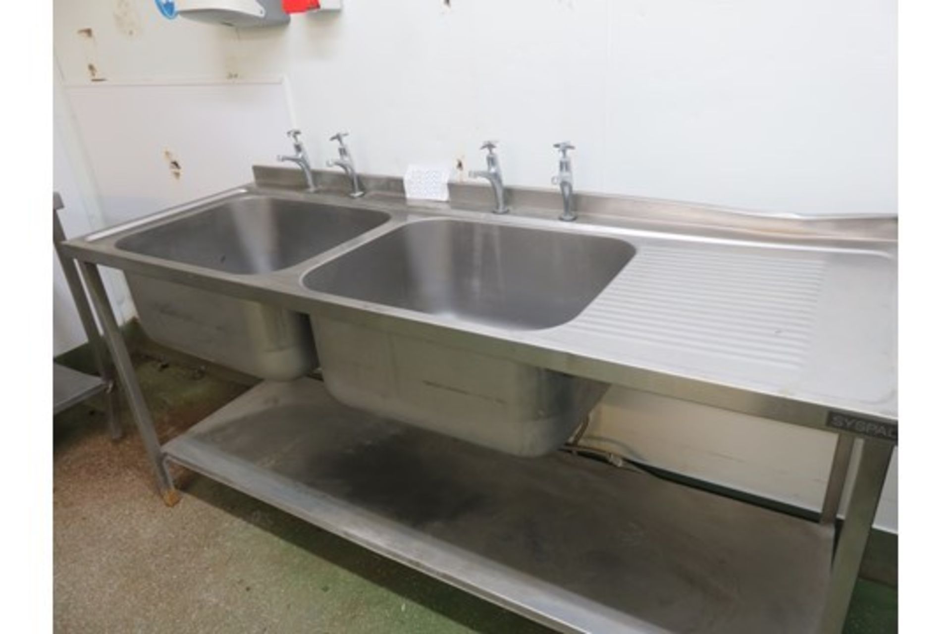 Syspal S/s Sink unit with draining board & shelf. Overall 1.8 metres long x 650mm deep. Freestanding