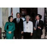 Hayek (Friedrich August).- Photograph of President and Barbara Bush with Laurence and Esca Hayek …