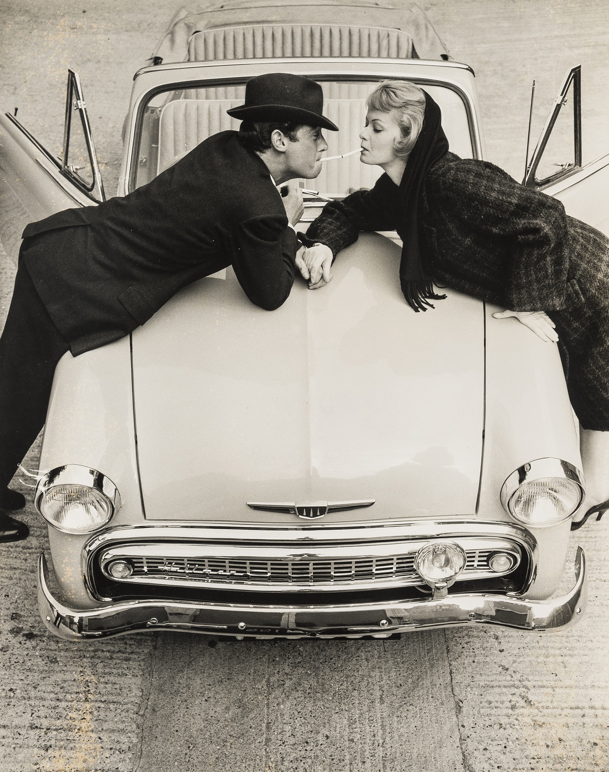 NO RESERVE Norman Parkinson (1913-1990) Three Fashion Photographs: Lighting Up Cigarette; Chess