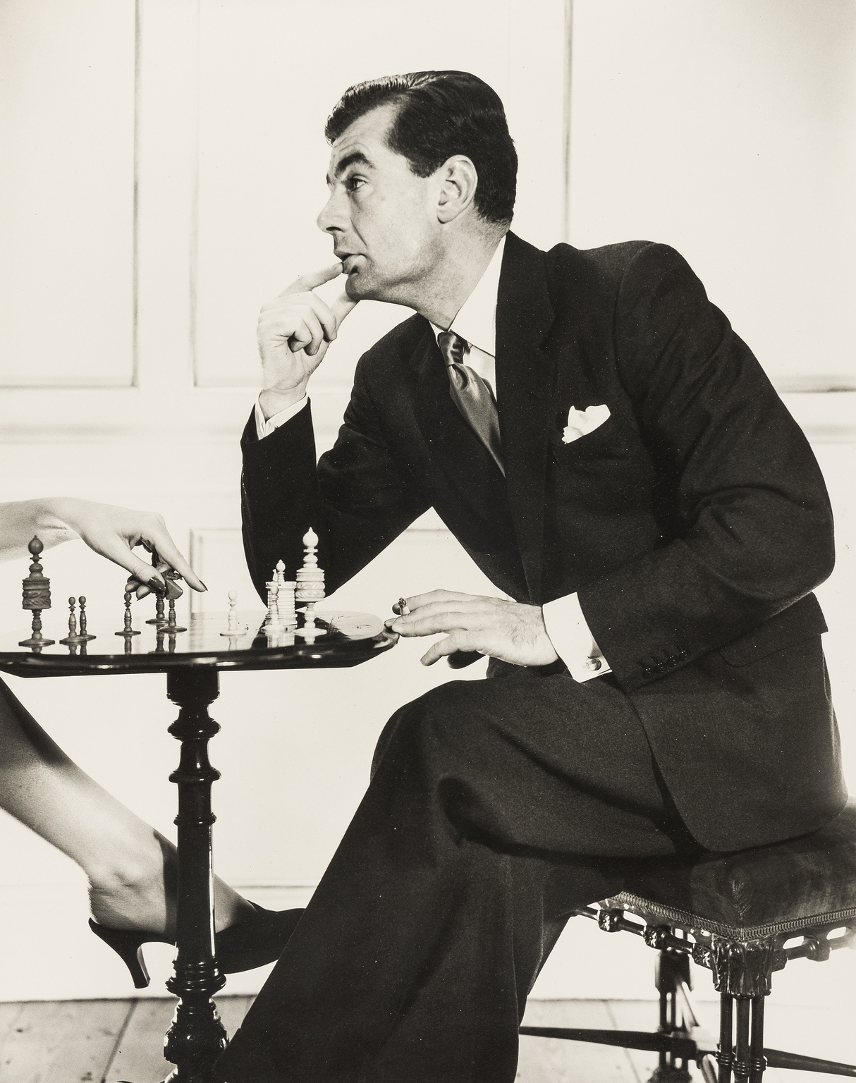 NO RESERVE Norman Parkinson (1913-1990) Three Fashion Photographs: Lighting Up Cigarette; Chess - Image 2 of 3