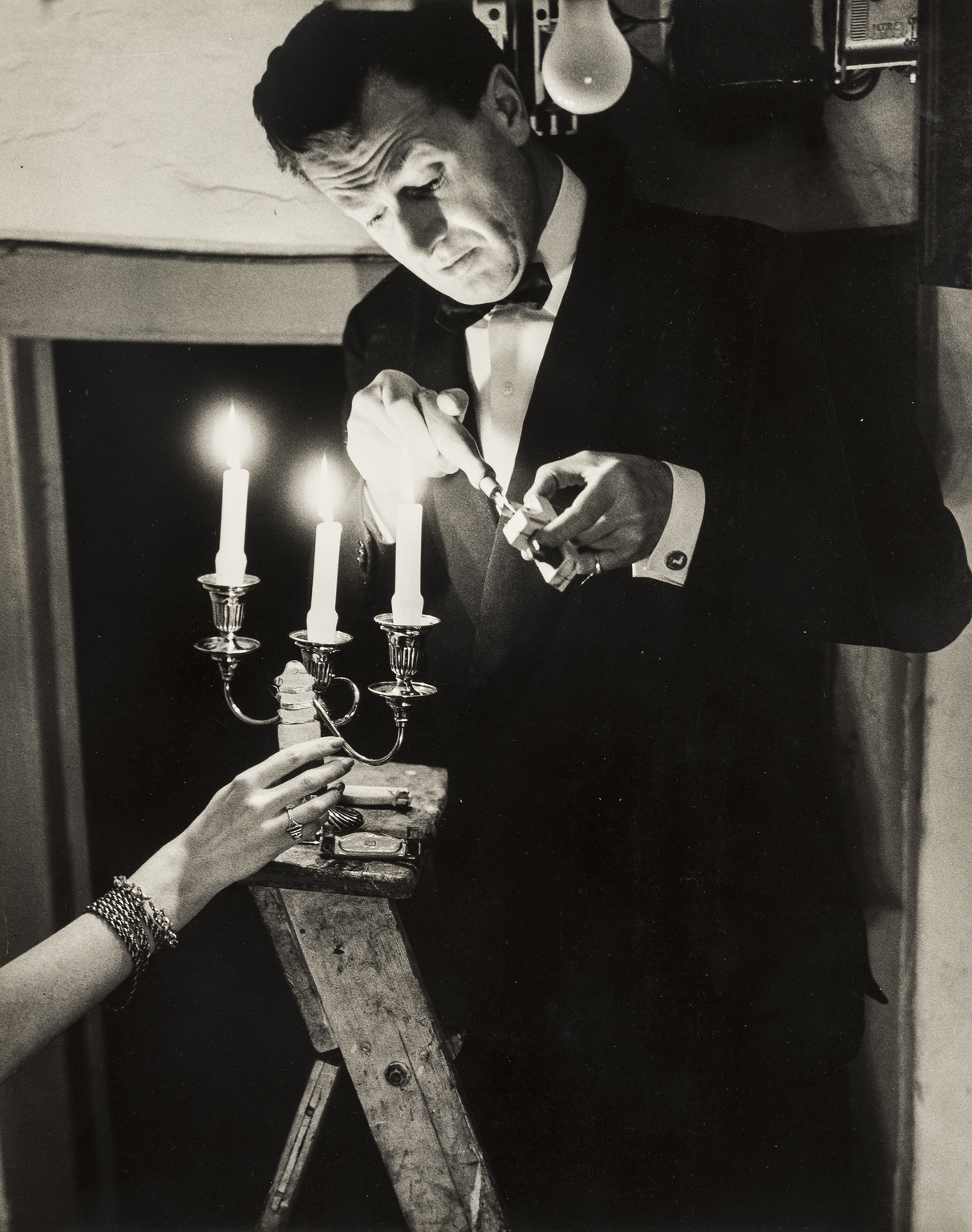 NO RESERVE Norman Parkinson (1913-1990) Chatting Up Girls; Candelabra Mending Fuse; Woman - Image 2 of 3