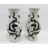 Pair of large craquelure Chinese baluster vases with Dragon and Pearl of Wisdom pattern in relief,