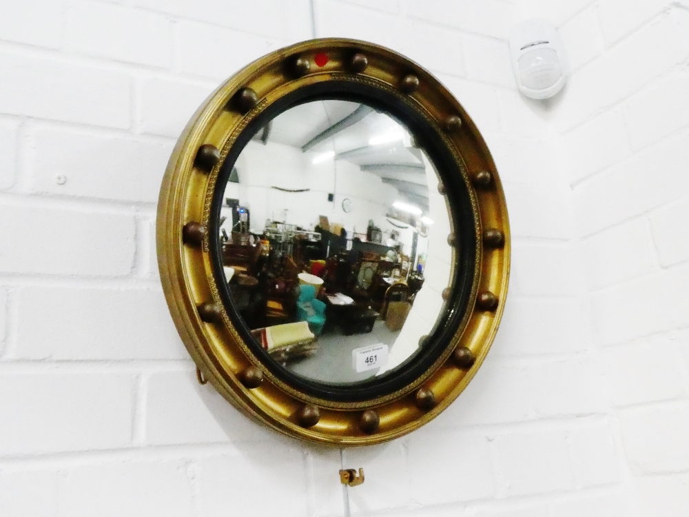 Circular gilt framed convex wall mirror