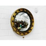 Circular gilt framed convex wall mirror