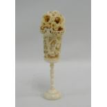 Early 20th century carved ivory puzzle ball on stand, 15.5cm high