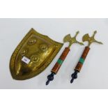 Eastern brass miniature shield and pair of decorative axes, (3)