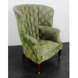 Wing back upholstered armchair with fan back, scroll arms and mahogany supports. 100 x 75cm