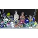 Quantity of glass paperweights, oil burners, salts, coloured eggs, jam jar and cover etc., (a