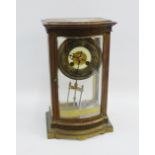 19th century brass and glass cased mantle clock with a silvered chapter ring and Arabic numerals and