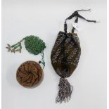 19th century crochet Miser's purse together with a leather circular purse with flowerhead top and