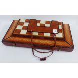 Unusual leather covered chess board box containing a set of painted wooden Russian style chess