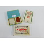Tiffany & Co, a boxed set containing two packs of playing cards, together with motor cars and in the