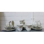 Royal Doulton 'Kingwood' pattern teaset comprising eight cups, eight saucers, eight side plates