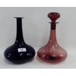 Early 19th century amethyst carafe, together with a late 19th century amethyst glass decanter and