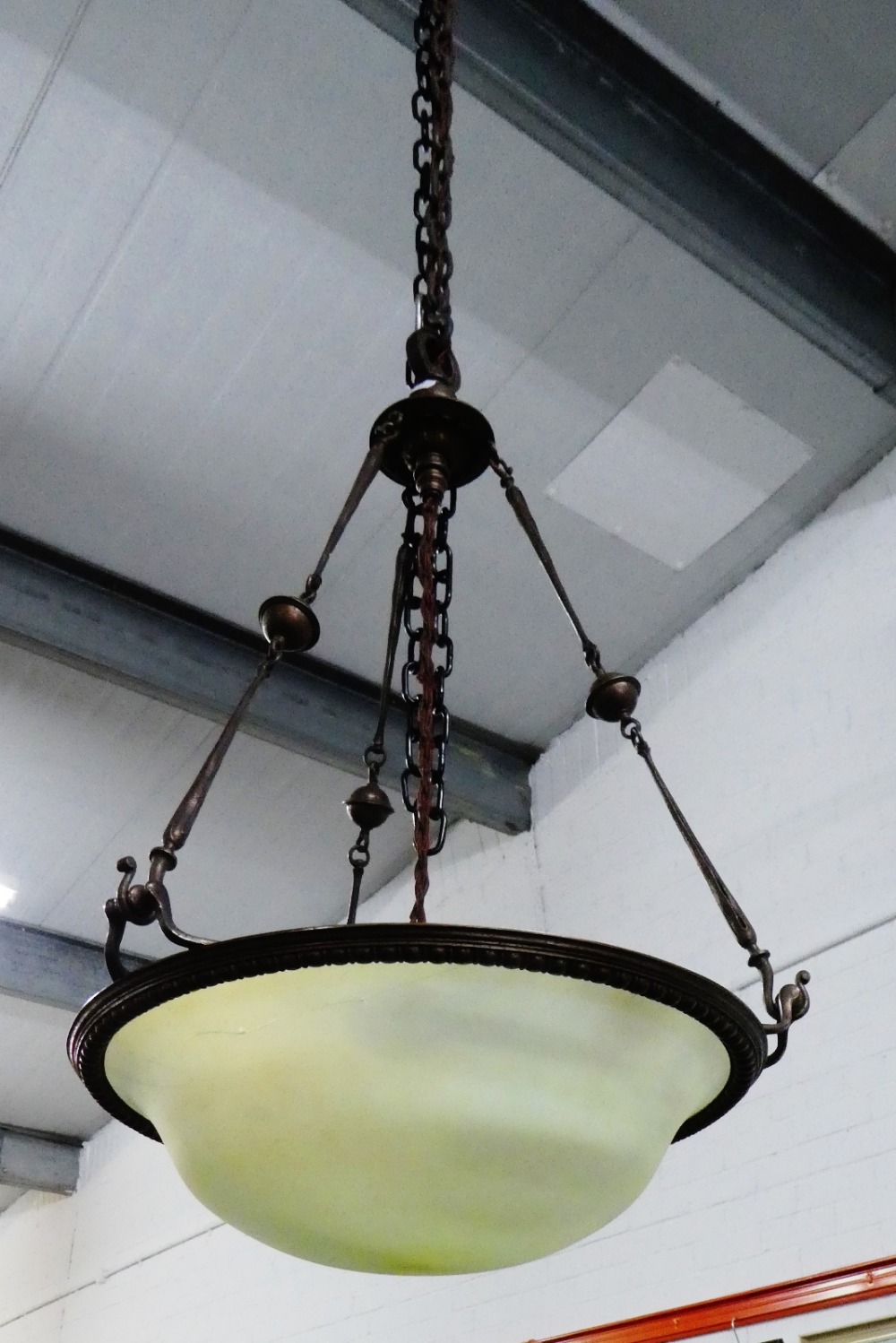 Bronze patinated metal light fitting with opaque glass shade (a/f)