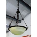 Bronze patinated metal light fitting with opaque glass shade (a/f)