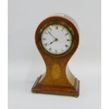 Edwardian mahogany and inlaid mantle clock, on four brass bun feet, 23cm high